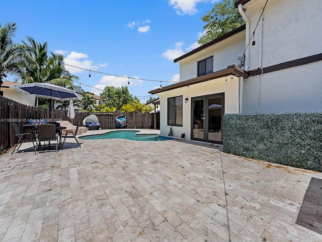 12749 SW 71st Ter, Miami, FL 33183 - fenced backyard with a patio area and outdoor dining area