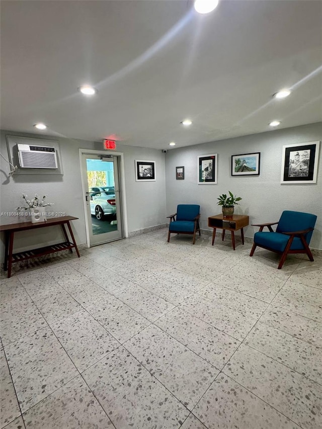 700 NE 14th Ave Unit 204, Hallandale Beach, FL 33009 - living area with recessed lighting and a wall mounted AC