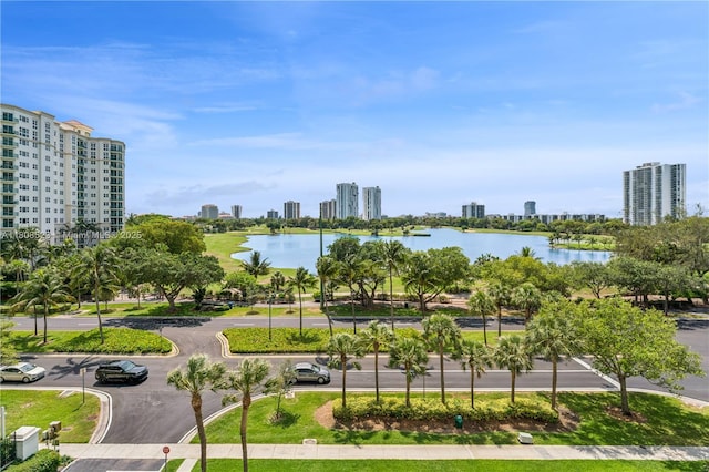 20185 E Country Club Dr Unit 505, Aventura, FL 33180 - view of community with a view of skyline, a water view, and uncovered parking