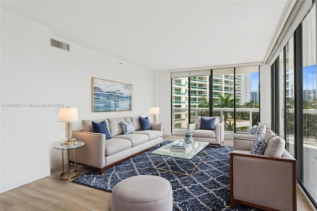 20185 E Country Club Dr Unit 505, Aventura, FL 33180 - living area with wood finished floors