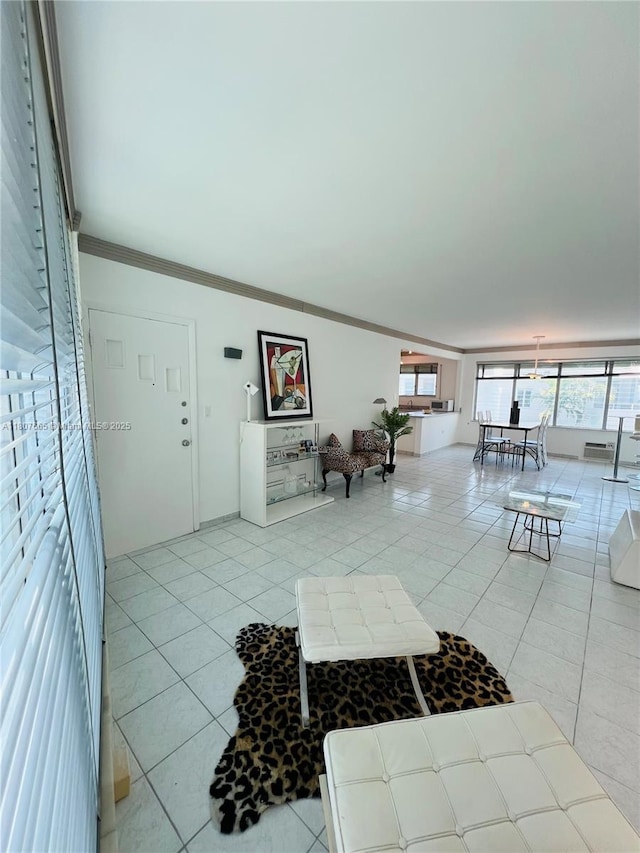 10178 Collins Ave Unit 210, Bal Harbour, FL 33154 - tiled living room featuring crown molding