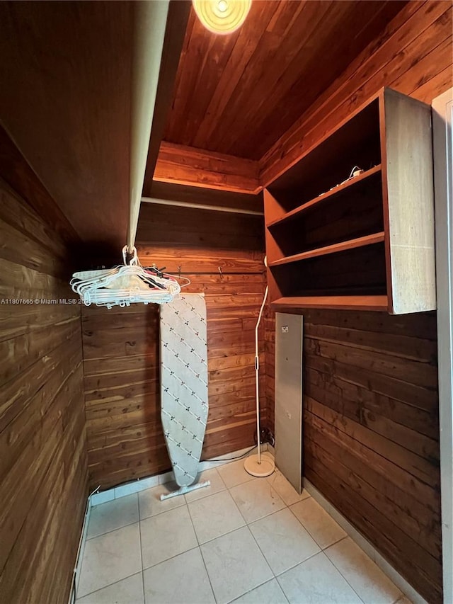 10178 Collins Ave Unit 210, Bal Harbour, FL 33154 - walk in closet with tile patterned floors