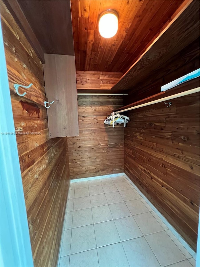 10178 Collins Ave Unit 210, Bal Harbour, FL 33154 - spacious closet with tile patterned floors