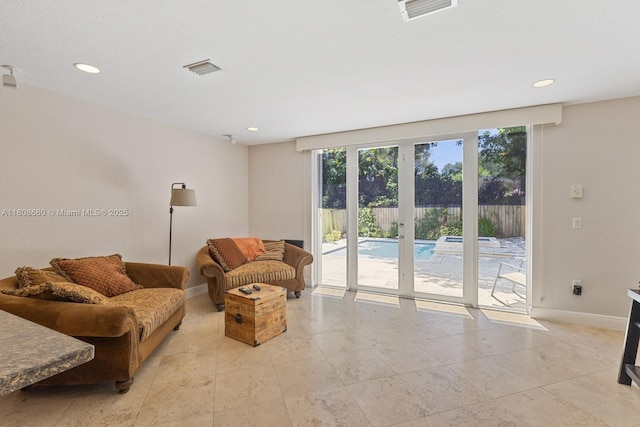 2922 Catalina St Unit 2922, Miami, FL 33133 - living area featuring recessed lighting, baseboards, and light tile patterned floors