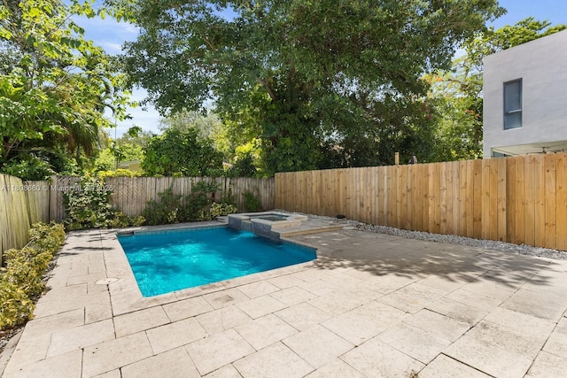2922 Catalina St Unit 2922, Miami, FL 33133 - view of pool with a patio, a fenced backyard, and a pool with connected hot tub