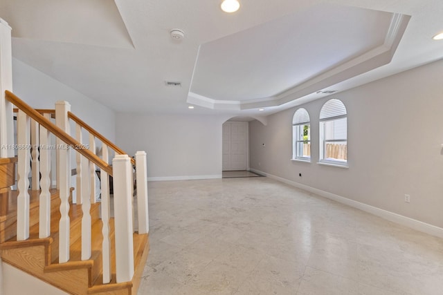 2922 Catalina St Unit 2922, Miami, FL 33133 - empty room with a tray ceiling, arched walkways, recessed lighting, baseboards, and a smoke detector