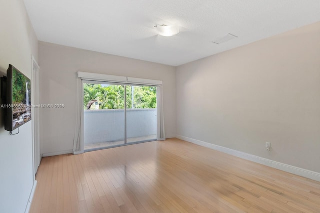 2922 Catalina St Unit 2922, Miami, FL 33133 - spare room with light wood-style flooring and baseboards