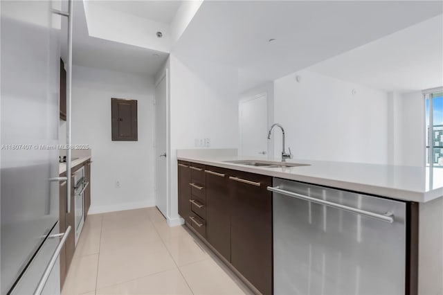 500 Brickell Ave Unit 3103, Miami, FL 33131 - kitchen with stainless steel appliances, a sink, electric panel, modern cabinets, and light countertops