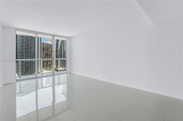 500 Brickell Ave Unit 3103, Miami, FL 33131 - unfurnished room featuring floor to ceiling windows