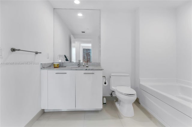 500 Brickell Ave Unit 3103, Miami, FL 33131 - full bath featuring toilet, a garden tub, vanity, recessed lighting, and tile patterned flooring