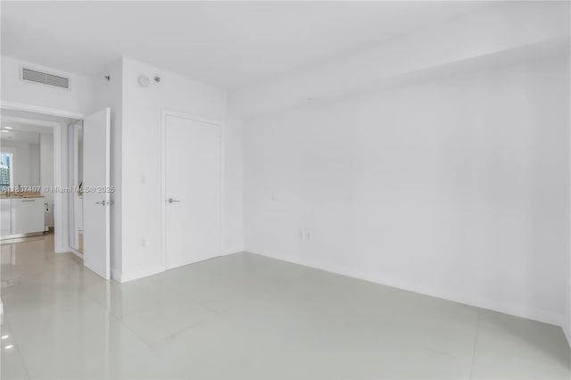 500 Brickell Ave Unit 3103, Miami, FL 33131 - spare room with light tile patterned flooring