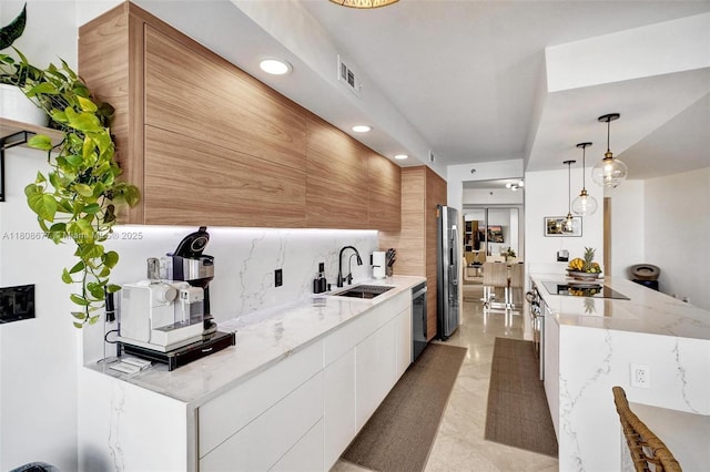 1000 W Island Blvd Unit 611, Aventura, FL 33160 - kitchen with a sink, modern cabinets, decorative backsplash, decorative light fixtures, and stainless steel appliances