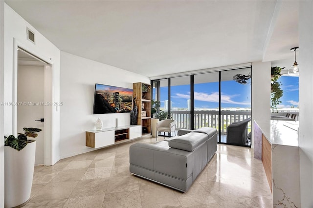 1000 W Island Blvd Unit 611, Aventura, FL 33160 - living room with a wall of windows