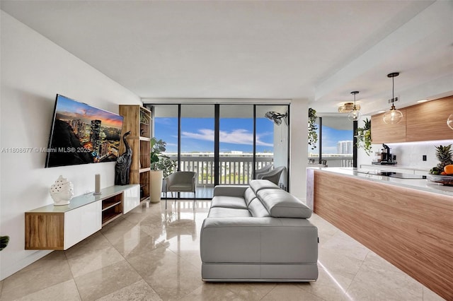 1000 W Island Blvd Unit 611, Aventura, FL 33160 - living area with a wall of windows