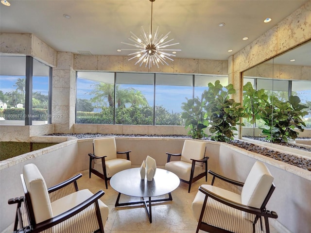 1000 W Island Blvd Unit 611, Aventura, FL 33160 - sunroom / solarium with plenty of natural light and a chandelier
