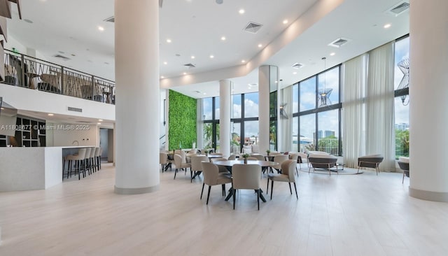 1000 W Island Blvd Unit 611, Aventura, FL 33160 - building lobby with a high ceiling, floor to ceiling windows, and recessed lighting