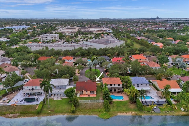 8749 NW 189th Ter, Hialeah, FL 33018 - aerial perspective of suburban area with a pool area and a large body of water