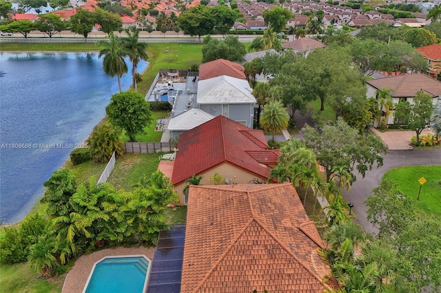 8749 NW 189th Ter, Hialeah, FL 33018 - aerial view of residential area with a nearby body of water and a pool area