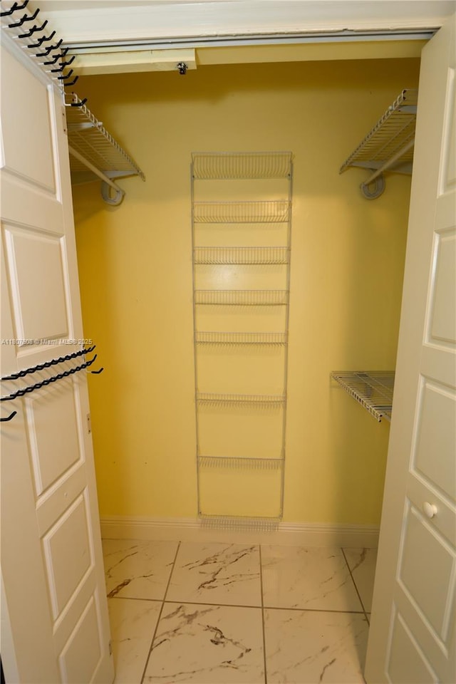 16401 SW 141st Ave, Miami, FL 33177 - spacious closet featuring light marble finish flooring
