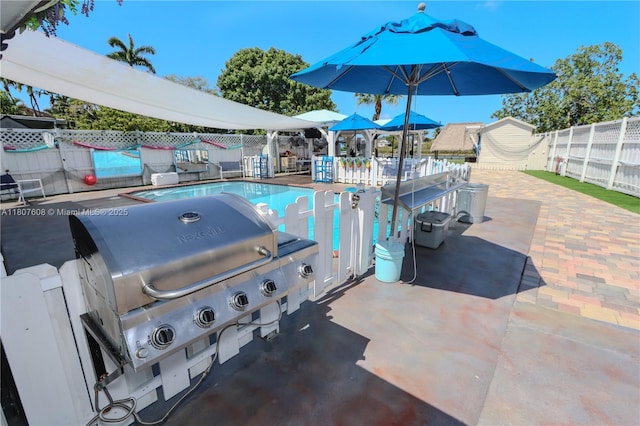 16401 SW 141st Ave, Miami, FL 33177 - fenced backyard featuring a patio area and grilling area