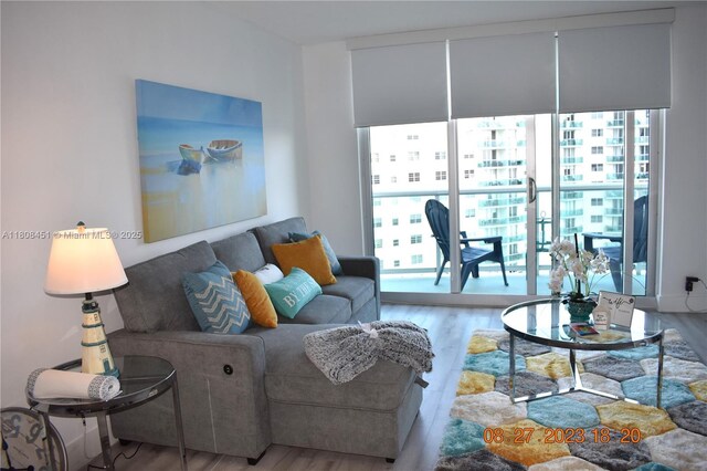3901 S Ocean Dr Unit 11A, Hollywood, FL 33019 - living area with healthy amount of natural light and wood finished floors