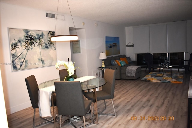 3901 S Ocean Dr Unit 11A, Hollywood, FL 33019 - dining area with wood finished floors and baseboards