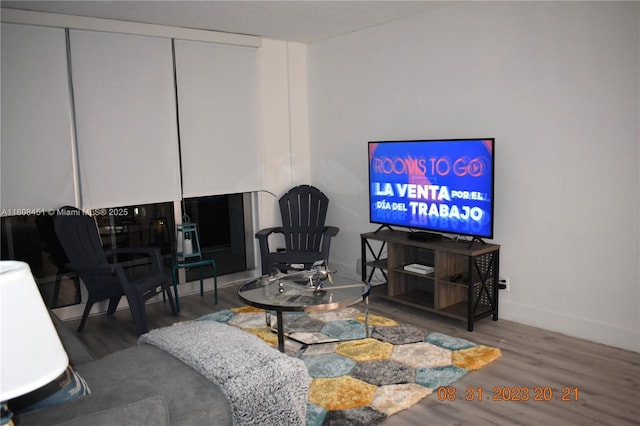 3901 S Ocean Dr Unit 11A, Hollywood, FL 33019 - living area featuring wood finished floors and baseboards