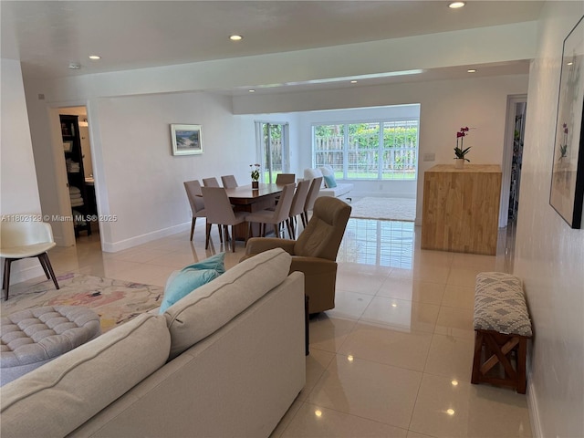 4441 NE 17th Ave, Oakland Park, FL 33334 - living room featuring light tile patterned floors and recessed lighting