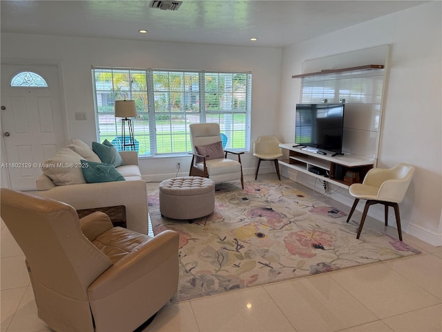 4441 NE 17th Ave, Oakland Park, FL 33334 - tiled living room featuring plenty of natural light and recessed lighting