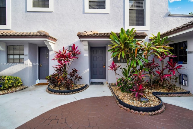 11604 NW 11th St, Pembroke Pines, FL 33026 - property entrance with stucco siding and a tile roof