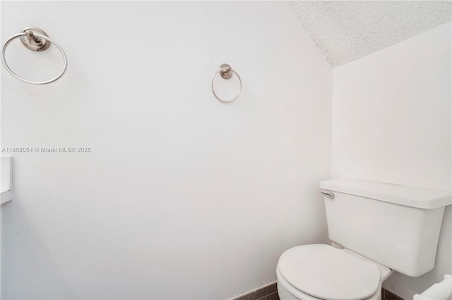 11604 NW 11th St, Pembroke Pines, FL 33026 - bathroom with a textured ceiling and toilet