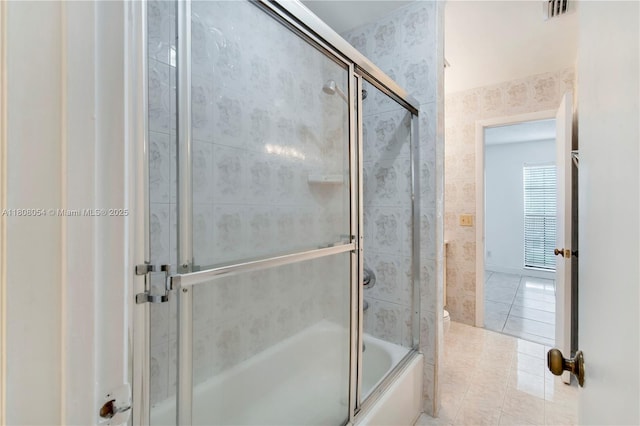 11604 NW 11th St, Pembroke Pines, FL 33026 - bathroom with tile patterned floors, combined bath / shower with glass door, and toilet