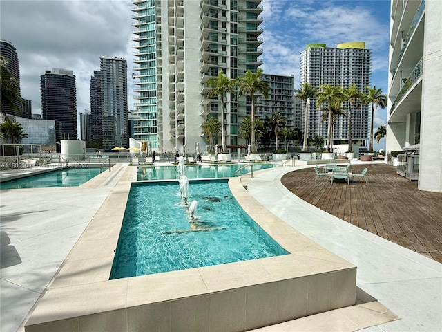 90 SW 3rd St Unit 1208, Miami, FL 33130 - community pool with a view of city and a patio