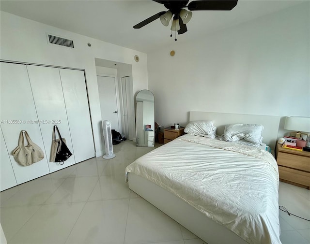90 SW 3rd St Unit 1208, Miami, FL 33130 - tiled bedroom with ceiling fan