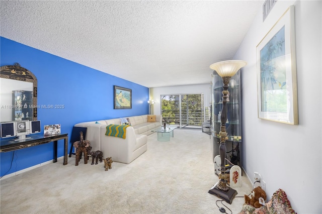 2504 Antigua Ter Unit O3, Coconut Creek, FL 33066 - carpeted living area featuring a textured ceiling