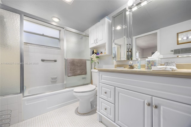 2504 Antigua Ter Unit O3, Coconut Creek, FL 33066 - full bath featuring toilet, combined bath / shower with glass door, tile patterned flooring, and vanity