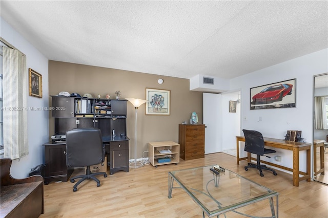 2504 Antigua Ter Unit O3, Coconut Creek, FL 33066 - office area with light wood-type flooring and a textured ceiling