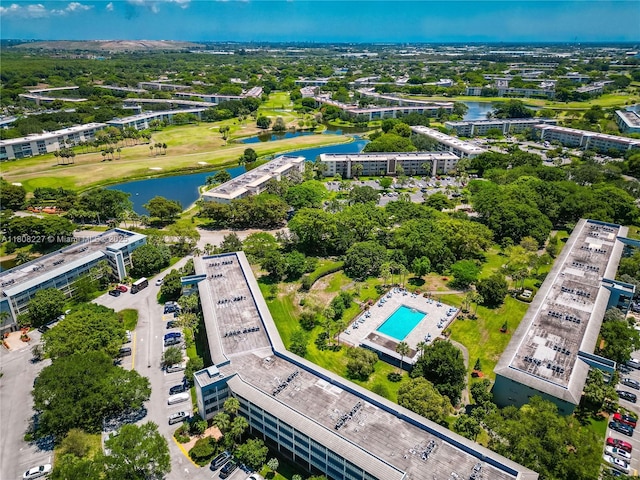 2504 Antigua Ter Unit O3, Coconut Creek, FL 33066 - aerial view of a nearby body of water, a pool area, and apartment complex / building