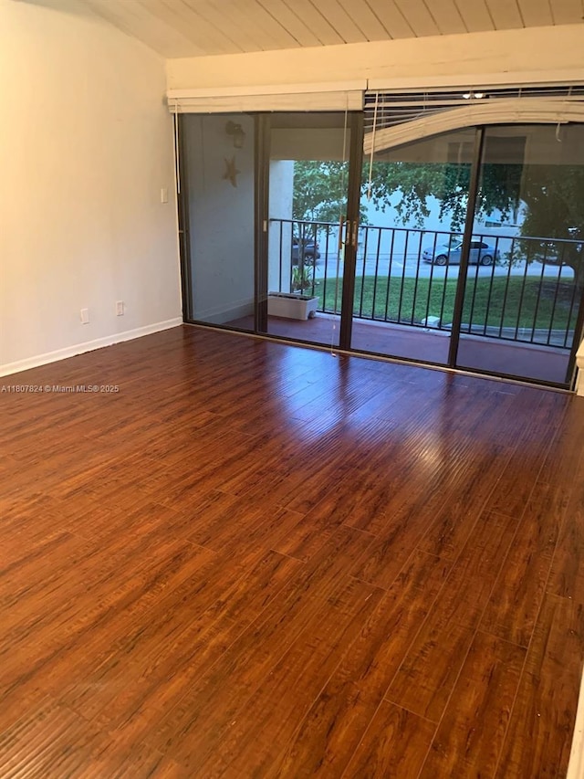 711 E Coco Plum Cir Unit 5, Plantation, FL 33324 - empty room featuring wood finished floors and baseboards