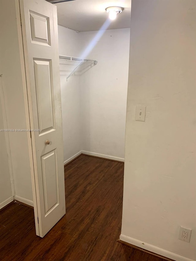 711 E Coco Plum Cir Unit 5, Plantation, FL 33324 - spacious closet featuring dark wood-style flooring