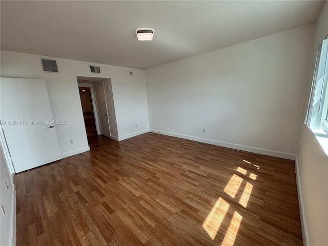 15051 Royal Oaks Ln Unit 1604, North Miami, FL 33181 - spare room with wood finished floors and baseboards