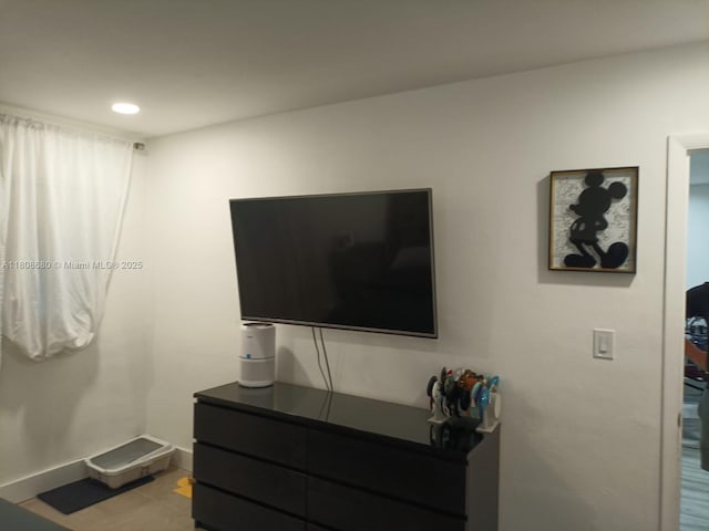 2005 Sans Souci Blvd Unit 202, North Miami, FL 33181 - living area featuring tile patterned floors, baseboards, and recessed lighting