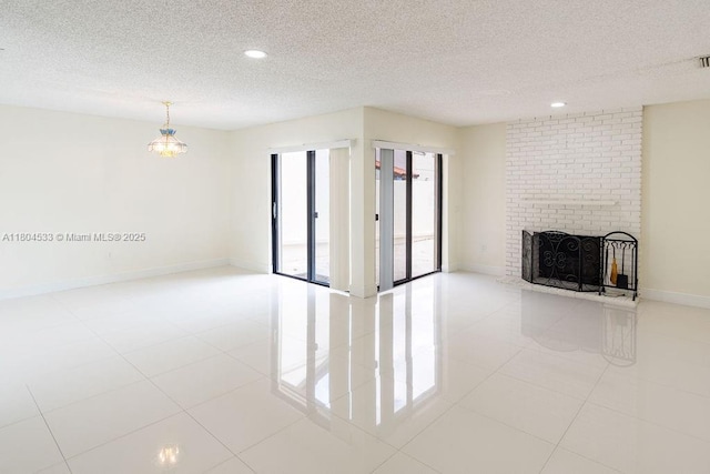 17359 NW 66th Ct, Hialeah, FL 33015 - unfurnished living room with a brick fireplace, a textured ceiling, baseboards, recessed lighting, and tile patterned flooring