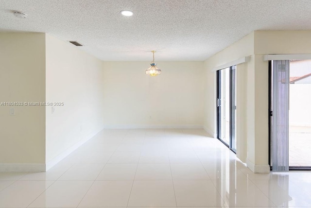17359 NW 66th Ct, Hialeah, FL 33015 - unfurnished room featuring a smoke detector, recessed lighting, a textured ceiling, baseboards, and light tile patterned floors