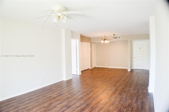 733 SE 1st Way Unit 206, Deerfield Beach, FL 33441 - spare room featuring a chandelier, dark wood finished floors, and ceiling fan