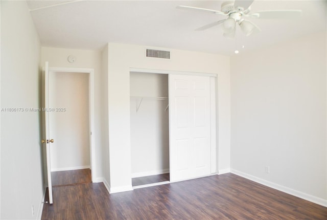 733 SE 1st Way Unit 206, Deerfield Beach, FL 33441 - unfurnished bedroom with wood finished floors, a closet, and a ceiling fan