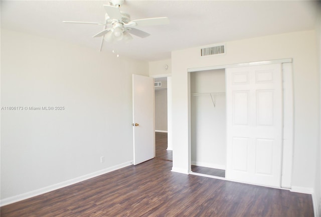 733 SE 1st Way Unit 206, Deerfield Beach, FL 33441 - unfurnished bedroom featuring dark wood-style flooring, a closet, and a ceiling fan