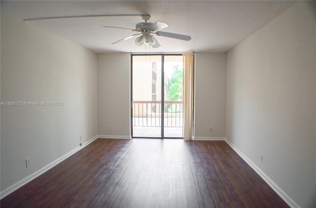 733 SE 1st Way Unit 206, Deerfield Beach, FL 33441 - unfurnished room with ceiling fan and dark wood-type flooring