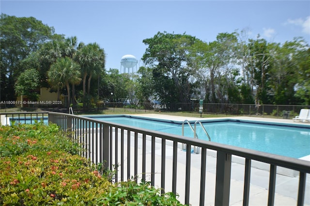 733 SE 1st Way Unit 206, Deerfield Beach, FL 33441 - community pool featuring view of wooded area