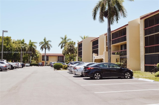 733 SE 1st Way Unit 206, Deerfield Beach, FL 33441 - view of property with uncovered parking